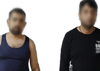 Policías Estatales aseguran a dos civiles con arma de fuego