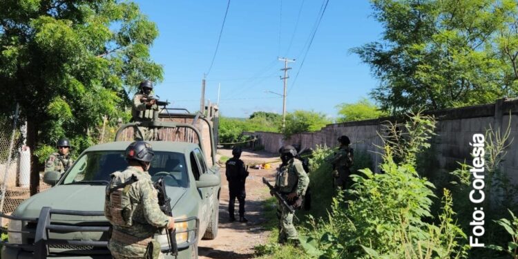Asesinados y con un carrito de juguete localizan a dos hombres en la colonia El Barrio, Culiacán