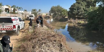Localizan cadáver flotando en aguas del canal Cañero en Culiacán